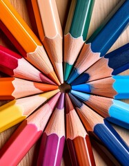 Fototapeta premium A vibrant arrangement of colorful colored pencils in a circular layout.