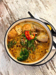 A bowl of pork laksa.
