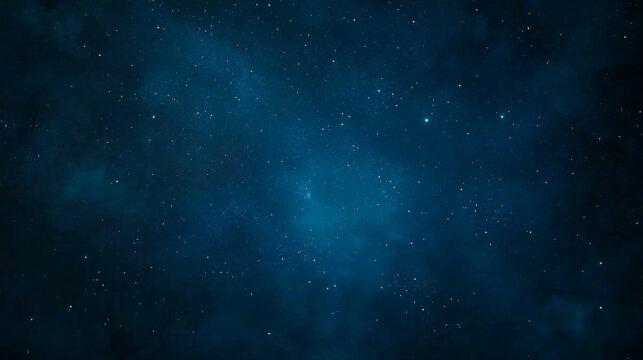 Wide-angle view of the night sky filled with stars and the glowing Milky Way galaxy in deep blue tones, featuring cosmic depth and celestial beauty in sharp high-resolution landscape format.