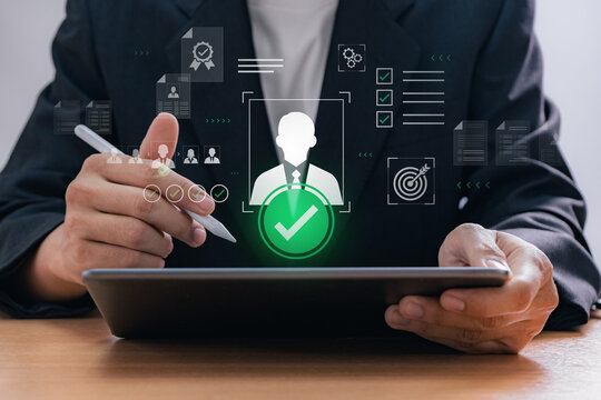 Digital recruitment process with HR manager selecting candidate using tablet in office environment, representing human resource technology and online hiring system in modern business workflow