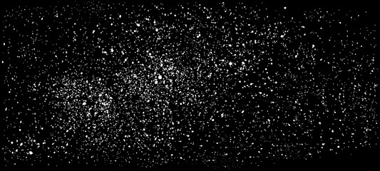 Black background with patches of white paint. Vector drops of paint are sprayed. The effect of dust, grain, and the starry sky. Grunge-style brushes, ink blots, dirty textures. 