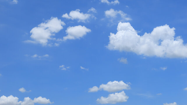White clouds on blue sky background