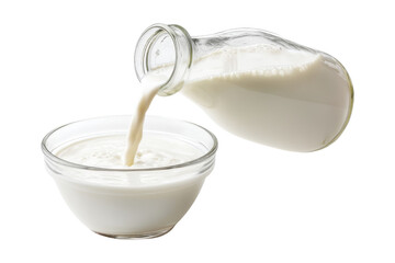Pouring fresh milk into bowl kitchen