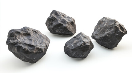 Naklejka premium Natural black rocks arranged on white background