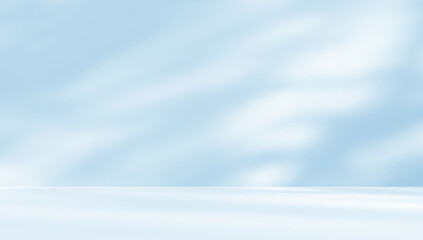 Obraz premium Empty blue room studio with shadow of leaves on concrete wall and floor for product presentation. Sunlight effect shadow. Minimal winter backdrop. Cosmetic, beauty and fashion showroom.