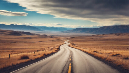 Fototapeta premium Desolate Winding Road Through a Barren Landscape