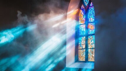 The ethereal glow of faith light streams through stained glass window