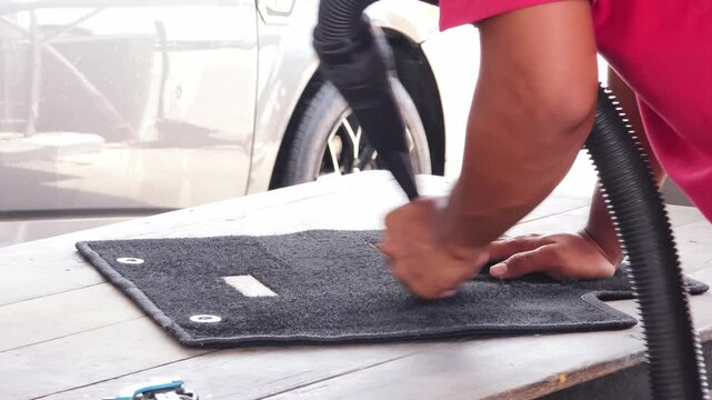 The professional car carpet cleaning process in action ensuring a spotless and fresh appearance