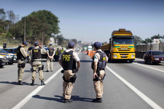 Sao Paulo, SP, Brazil - August 8, 2018: Federal police officers patrol the traffic in Presidente Dutra highway, BR 116.