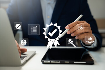 ISO certification and quality assurance, Businessman working with computer and tablet, Symbolizing compliance, Standards, Top service for product quality management. Businesses and companies.