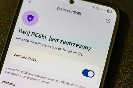 Warsaw, Poland - April 15, 2025: A smartphone screen displaying a message about the suspension of the PESEL number, emphasizing personal data protection.