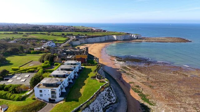 Aerial view of the beautiful Kingsgate Beach at the coast of Kent, England, with white chalk cliffs in the ocean