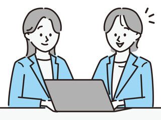 パソコンを使用する女性二人