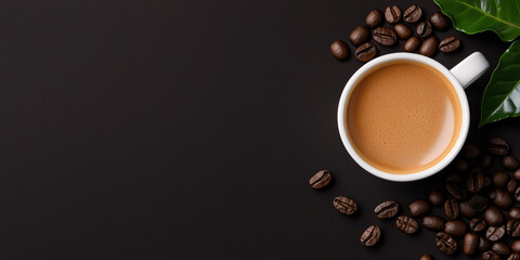 Obraz premium A top view of a coffee in white cup surrounded by scattered coffee beans, set on a dark brown background. 