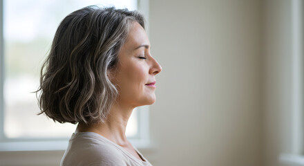 Middle-aged woman practicing calm breathing