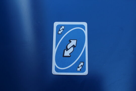 Blue uno reverse card on a blue background 