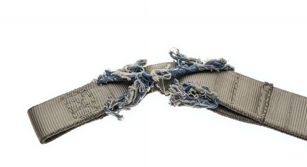 Damaged Tan Safety Harness Strap with Frayed Stitching Isolated on White