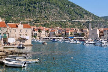 The beautiful town and harbor of Komiza, Island Vis, Dalmatia, Croatia