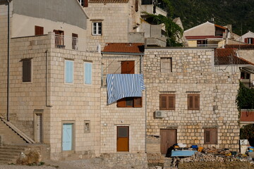 Old stone houses in the beautiful town of Komiza, Island Vis, Croatia
