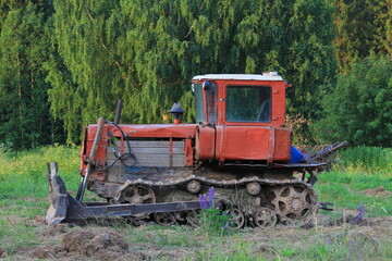 old soviet agricultural tractor for plowing land