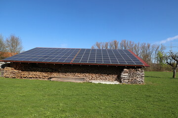 A large building with a roof covered in solar panels