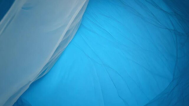 3d render of a sapphire blue background with layered tulle levitating ethereally, the scene evokes airiness with tulle drapery, floating weightlessly, with rim light and blue tones