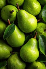 Overhead view of glossy ripe pears forming seamless golden green fruit composition