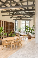 Fototapeta premium modern and bright interior featuring light wood furniture and abundant plants