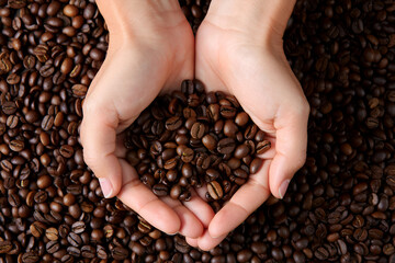coffee beans in hand