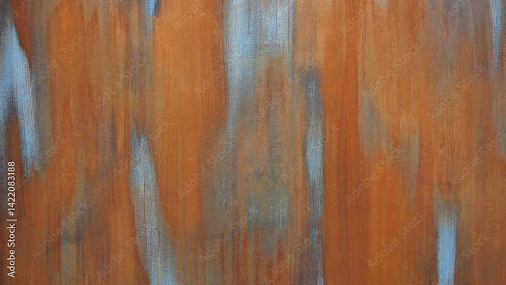 Aufkleber image is of a rustic, textured wall with a blue and orange color scheme. The wall appears to be made of wood and has a rough, uneven surface. The blue and orange colors create a warm
