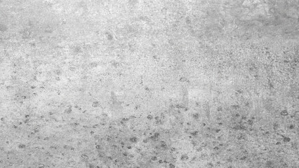 Gray rough textured abstract background. wall is made of concrete and has a rough texture