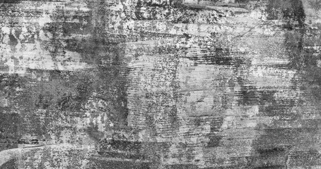 Gray wall with many cracks and holes. wall is made of concrete and has a rough texture as an abstract texture background for template pages and banners.