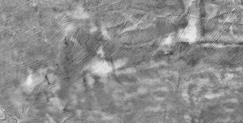 Gray wall with many cracks and holes. wall is made of concrete and has a rough texture as an abstract texture background for template pages and banners.