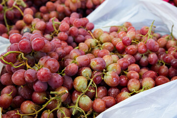 Crimson Grapes in White Plastic Bag, Close Up