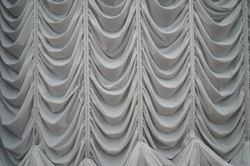 white curtains with drape