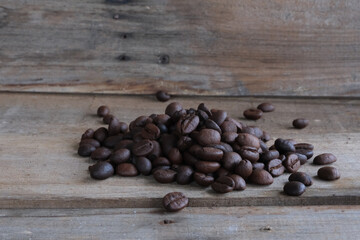 Coffee beans on a wooden background