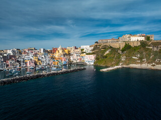 Fototapeta premium A top-down view of the vibrant rooftops and narrow alleys of Terra Murata, the oldest settlement on Procida island