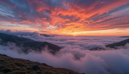 Breathtaking Sunset over Clouds in Majestic Mountain Landscape