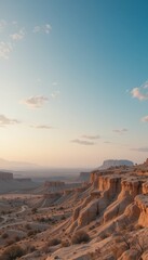 Fototapeta premium Serene Desert Landscape at Sunrise with Light Clouds and Warm Tones