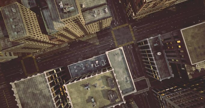 High above the city, a view reveals a complex network of streets and tall buildings during daylight. The arrangement of structures highlights urban planning and design.