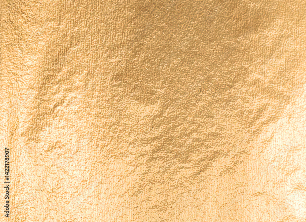 Aufkleber gold metallic foil background with a soft, smooth texture. elegant design in warm yellow tones, feat