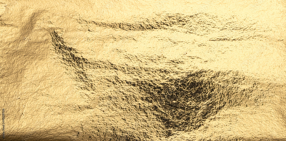 Poster Golden foil texture with a shiny, crumpled surface and dark, distressed patches. Abstract gradient design with shimmer and metallic glint. Rich, warm light reflecting on the worn, burnished sheet..