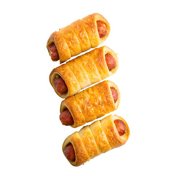 Overhead View of Several Pigs in a Blanket Arranged on a Baking Sheet