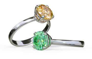 Two white gold rings, one with a yellow and one with a green gemstone. 3d illustration on white background