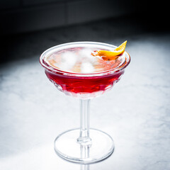Cocktail with reflections and dark background