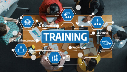 A dynamic training session featuring diverse participants engaged in e-learning and skill enhancement, highlighting collaboration and knowledge sharing in a modern environment. Amity