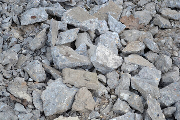 Fototapeta premium pieces of broken concrete are construction debris