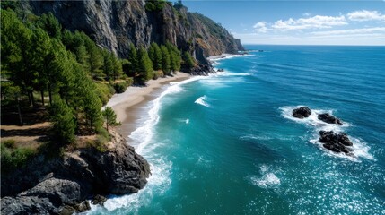 Obraz premium Calm coastal cliff view with blue ocean waves crashing