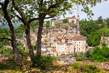 Rocamadour, the medieval village perched on a cliff over the Alzou valley in France, vertical view