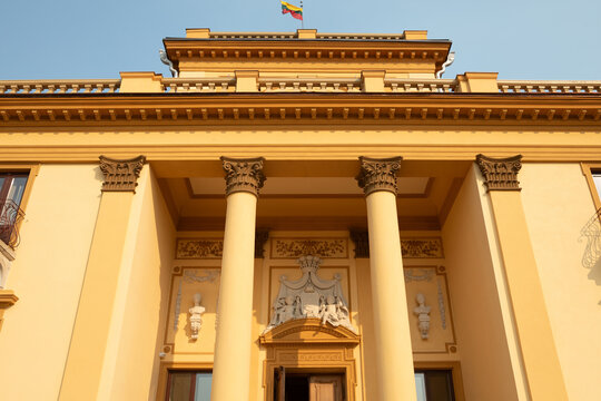 Front Facade with Columns and Sculptures of Traku Voke Manor in Vilnius, Lithuania on a Sunny Day